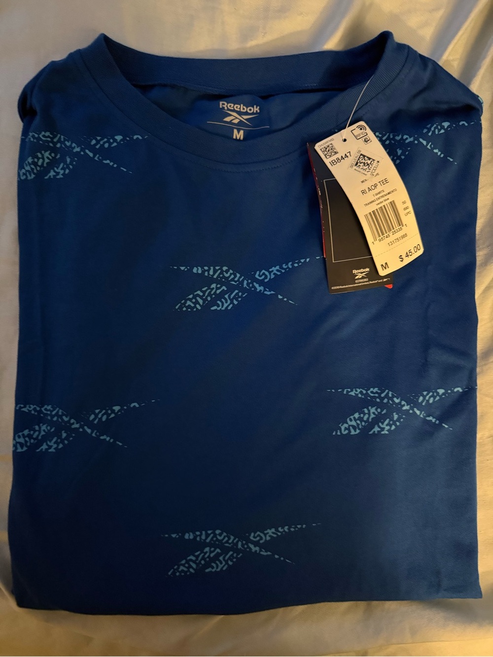 Reebok Men’s Royal Blue Short Sleeve Athletic Tee fits (like a large)
